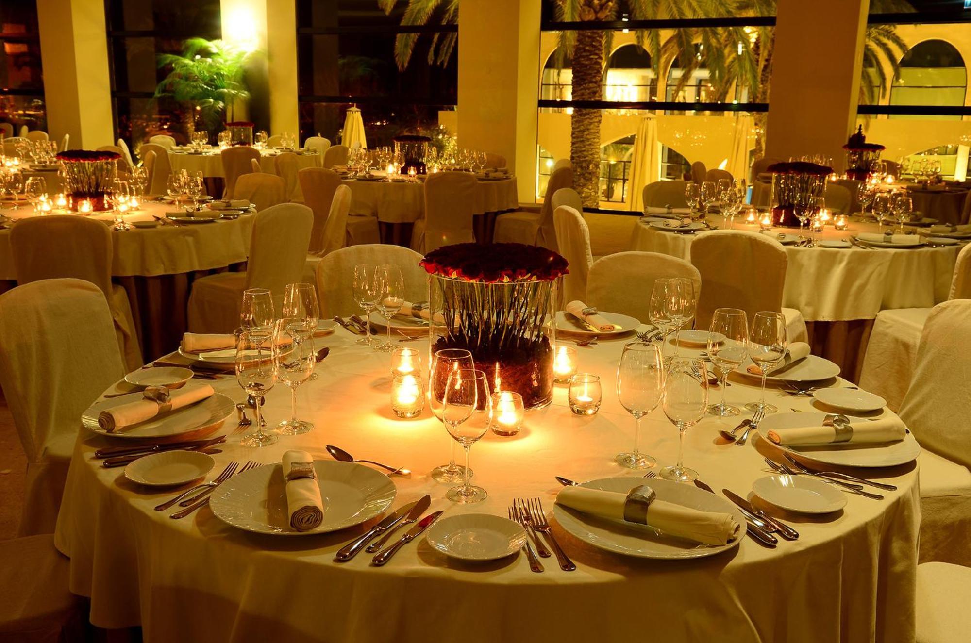 クラウンプラザ ヴィラモーラ ヴィラモウラ エクステリア 写真 A table set for a formal dinner